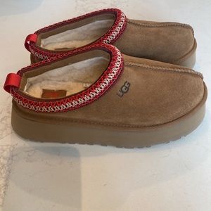 Ugg platform slip on NEW Never been worn